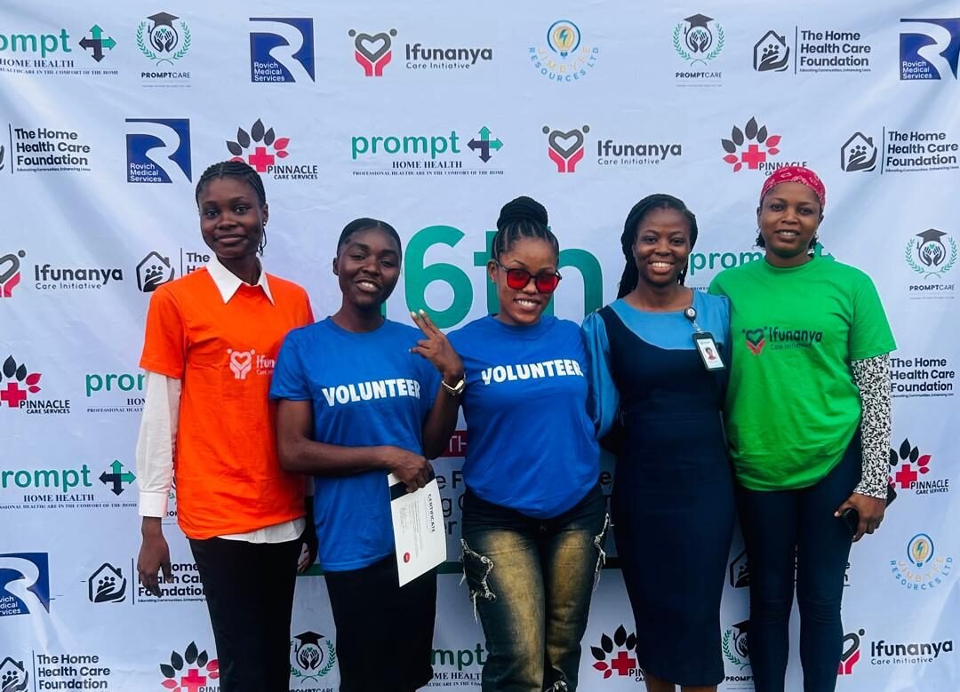 Some volunteers of the Ifunanya Care Initiative, including the founder, Victory Nzewi (second right)